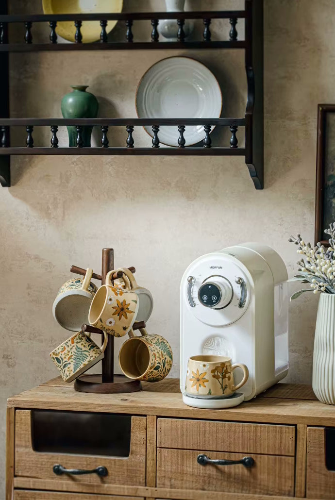 Coffee Maker On Coffee Counter With Mug Tree Enchanting Botanicals Pottery Cups With Floral Botany Patterns