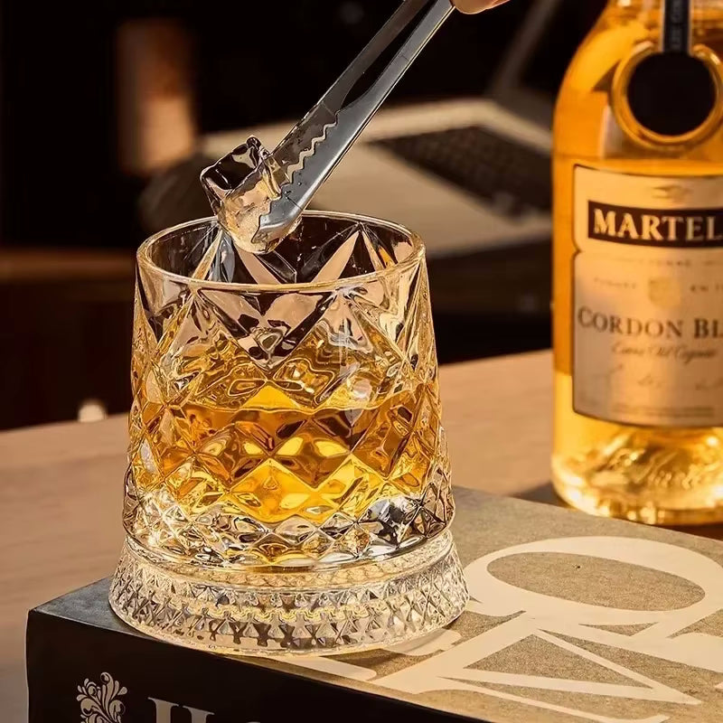 Adding Ice To Bar Drinkware Rotating Tumbler Glass With Coaster