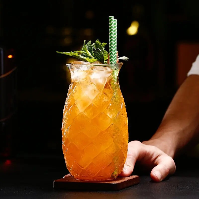 Bartender Serving Tropical Cocktail In Pineapple Glass