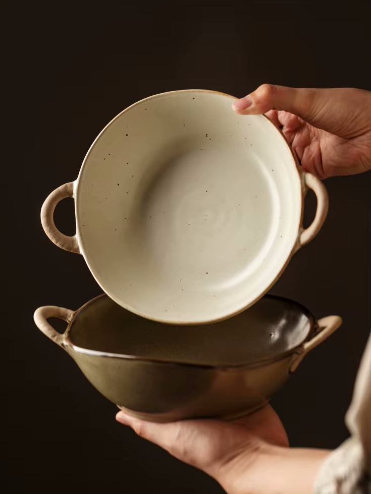 Holding 2 Farmhouse Villa Style Ceramic Bowls Complementing Neutral Colors
