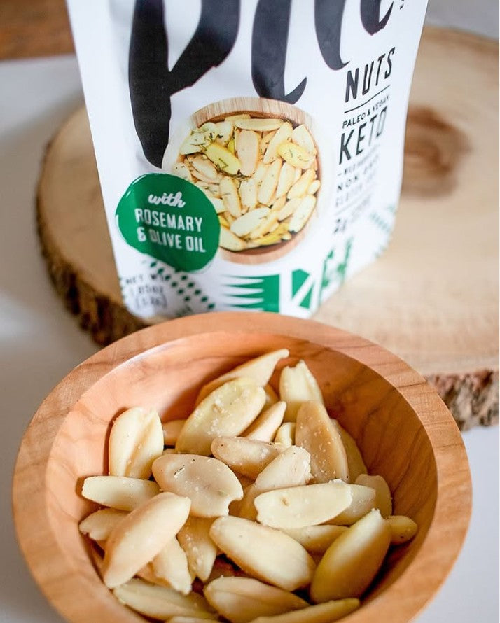 Wooden Bowl Of Pili Hunters Rosemary & Olive Oil Pili Nuts
