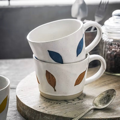 Stacked Mugs With Leafy Blue And Brown Leaf Patterns For Fall And Autumn Drinks Coffee Bar Farmhouse Decor