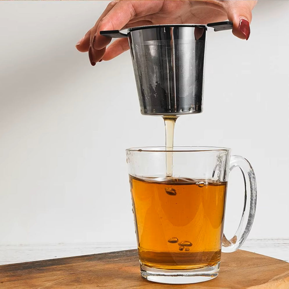 Making Tea With Tea Basket Stainless Steel Metal And Cool Touch Silicone Handles